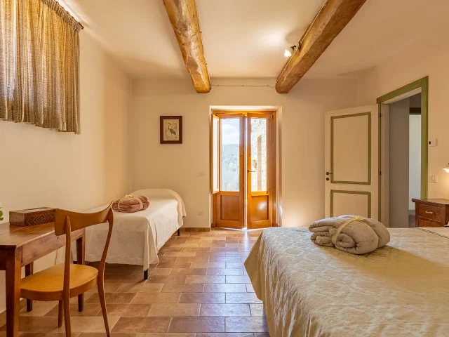 appartamento-capriolo-camera-1